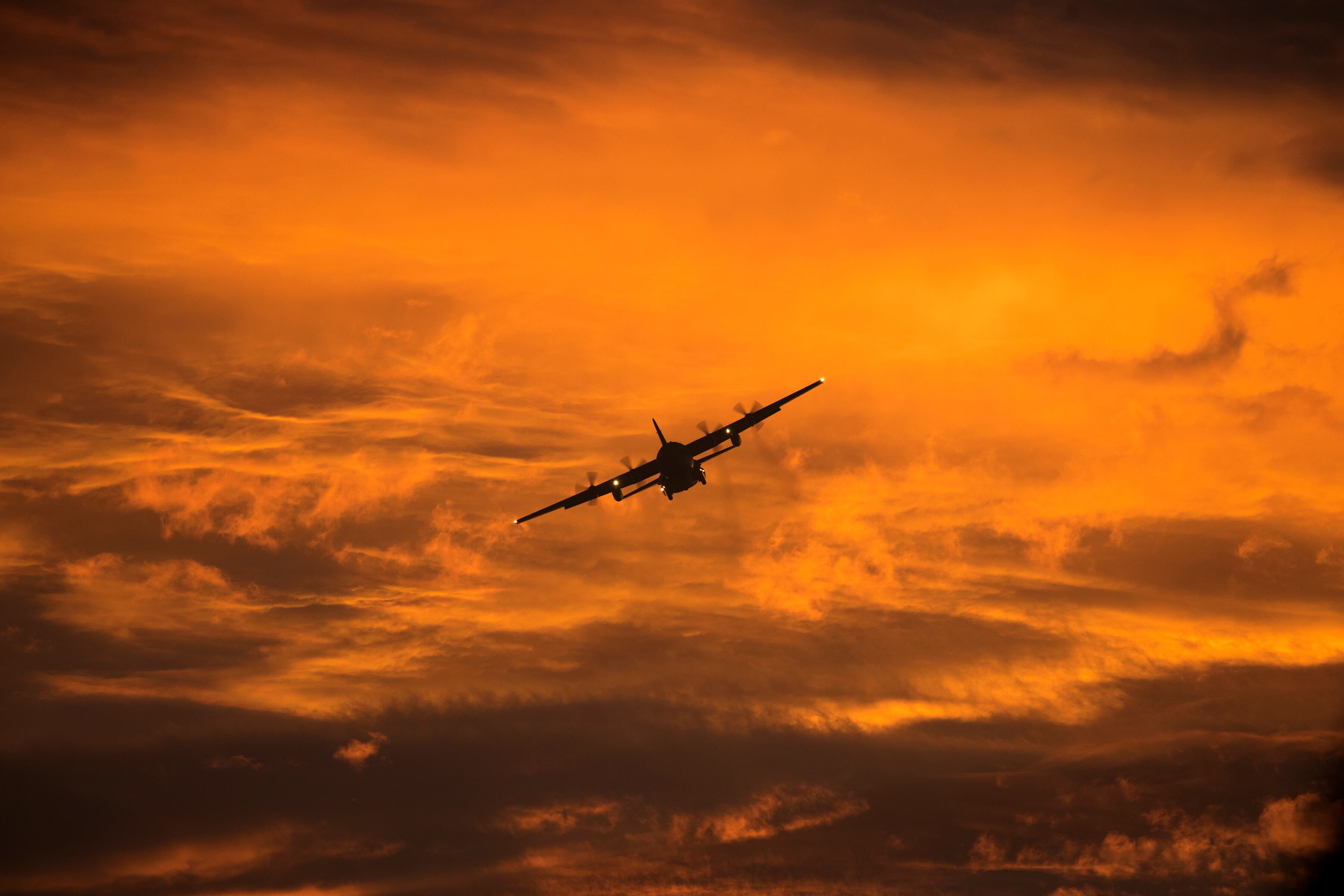 A C-130 Hercules flies over Yokota Air Base, Japan, during a routine sortie Sept. 12, 2017.