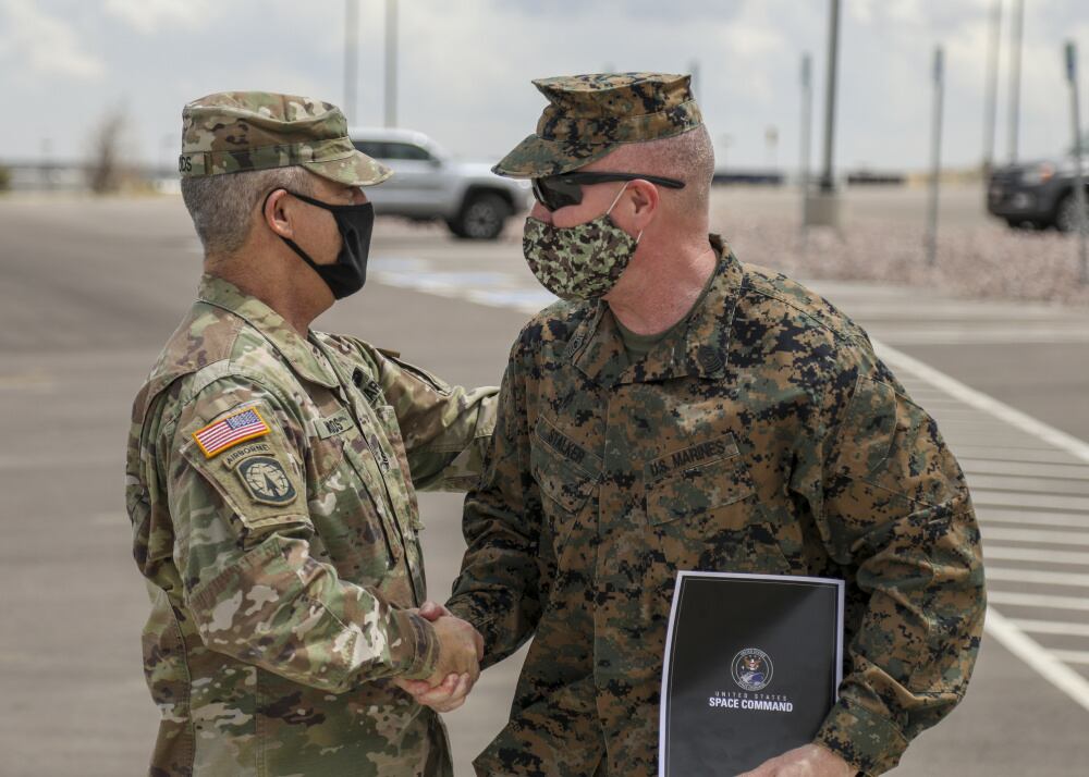 U.S. Marine Corps Master Gunnery Sgt. Scott H. Stalker, the senior enlisted leader of U.S. Space Command, visits with Colorado National Guard space noncommissioned officers at the 117th Space Battalion headquarters on Fort Carson, Colo., April 27, 2021. (Army National Guard/Staff Sgt. Zachary Sheely)