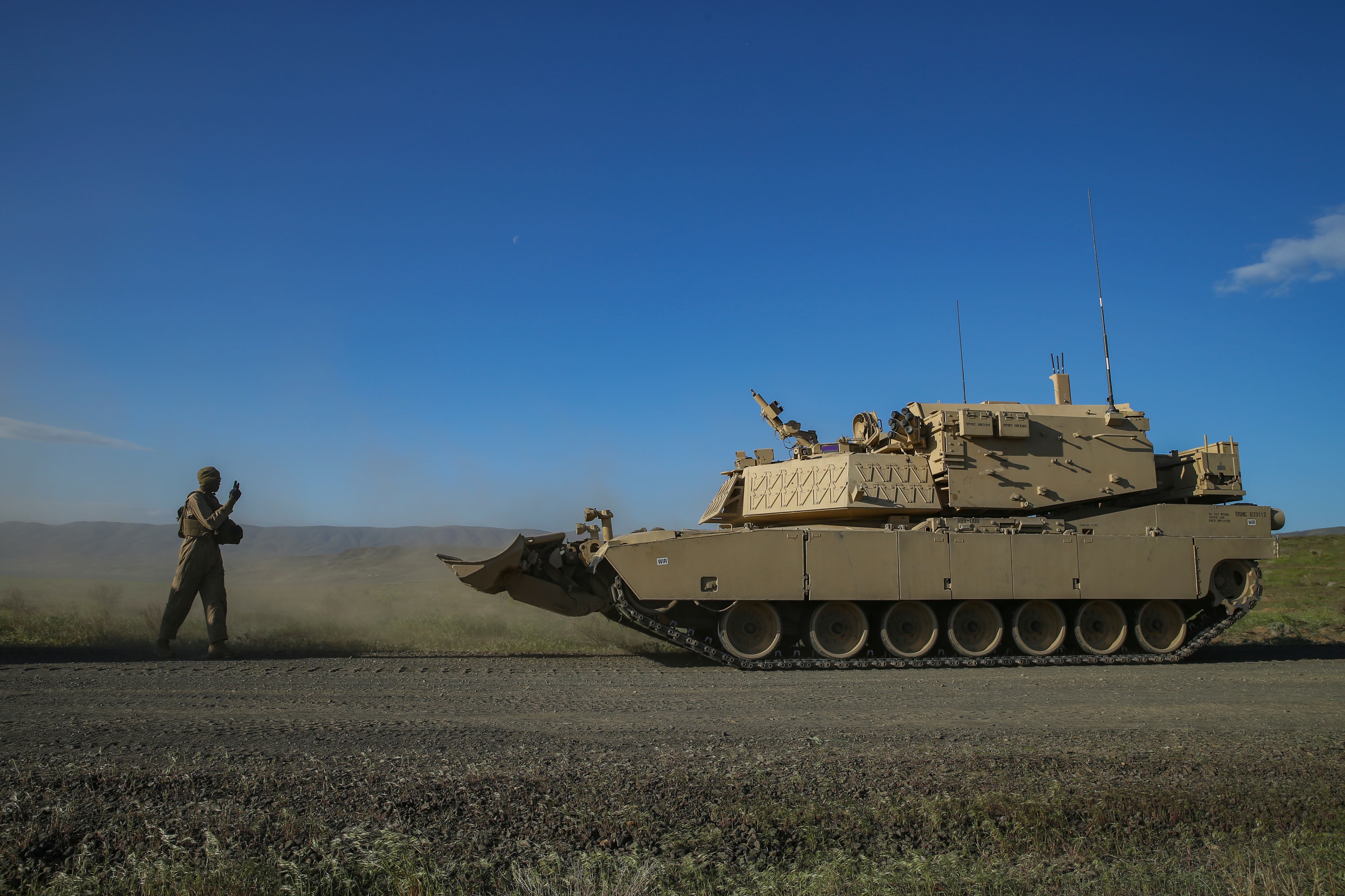 U.S. Marines conduct maintenance on Assault Breacher Vehicles during the Robotic Complex Breach Concept on Yakima Training Center in Yakima, Washington, in 2019.