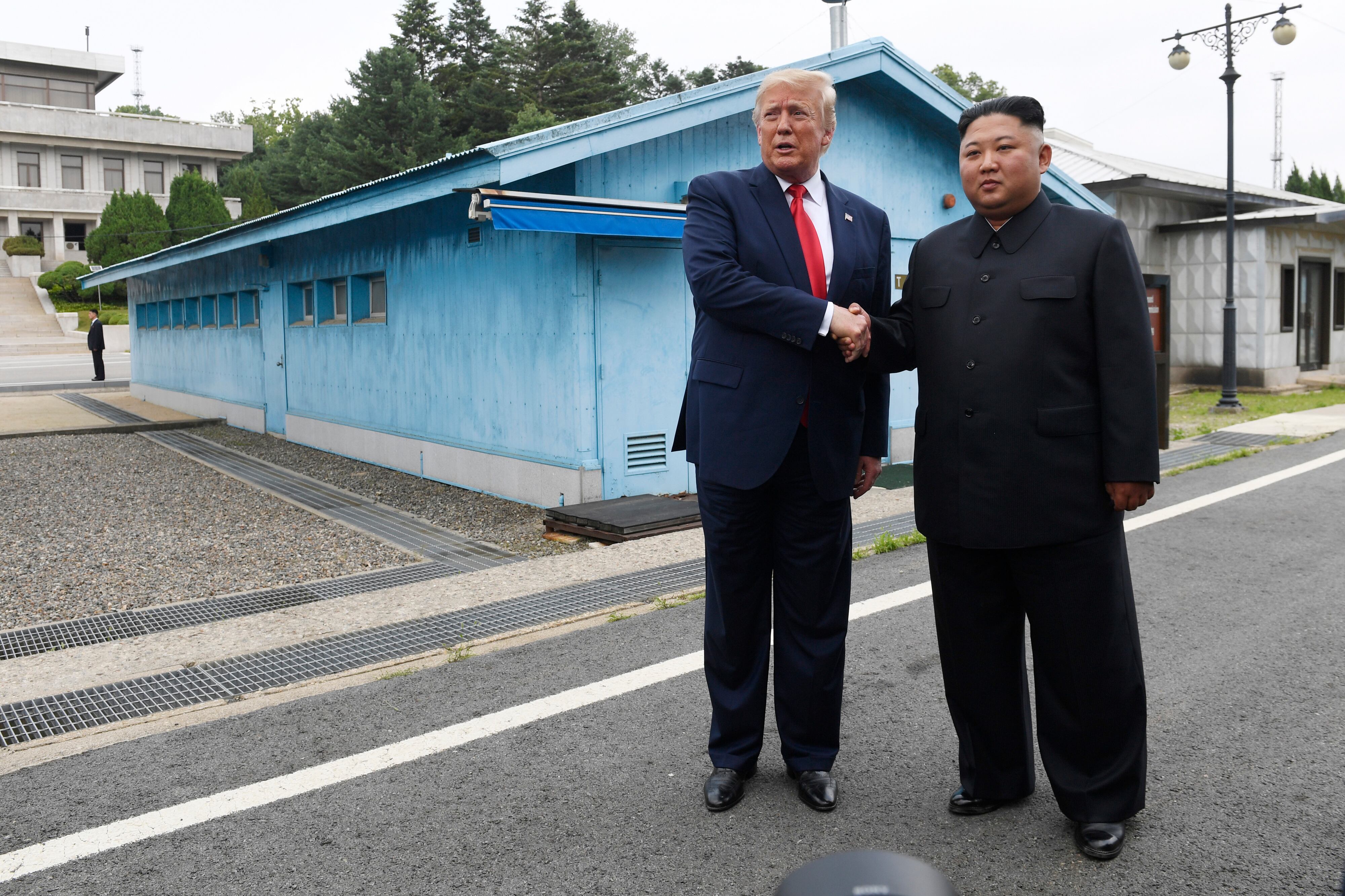 In this June 30, 2019, file photo, U.S. President Donald Trump, left, meets with North Korean leader Kim Jong Un at the border village of Panmunjom in the Demilitarized Zone, South Korea.