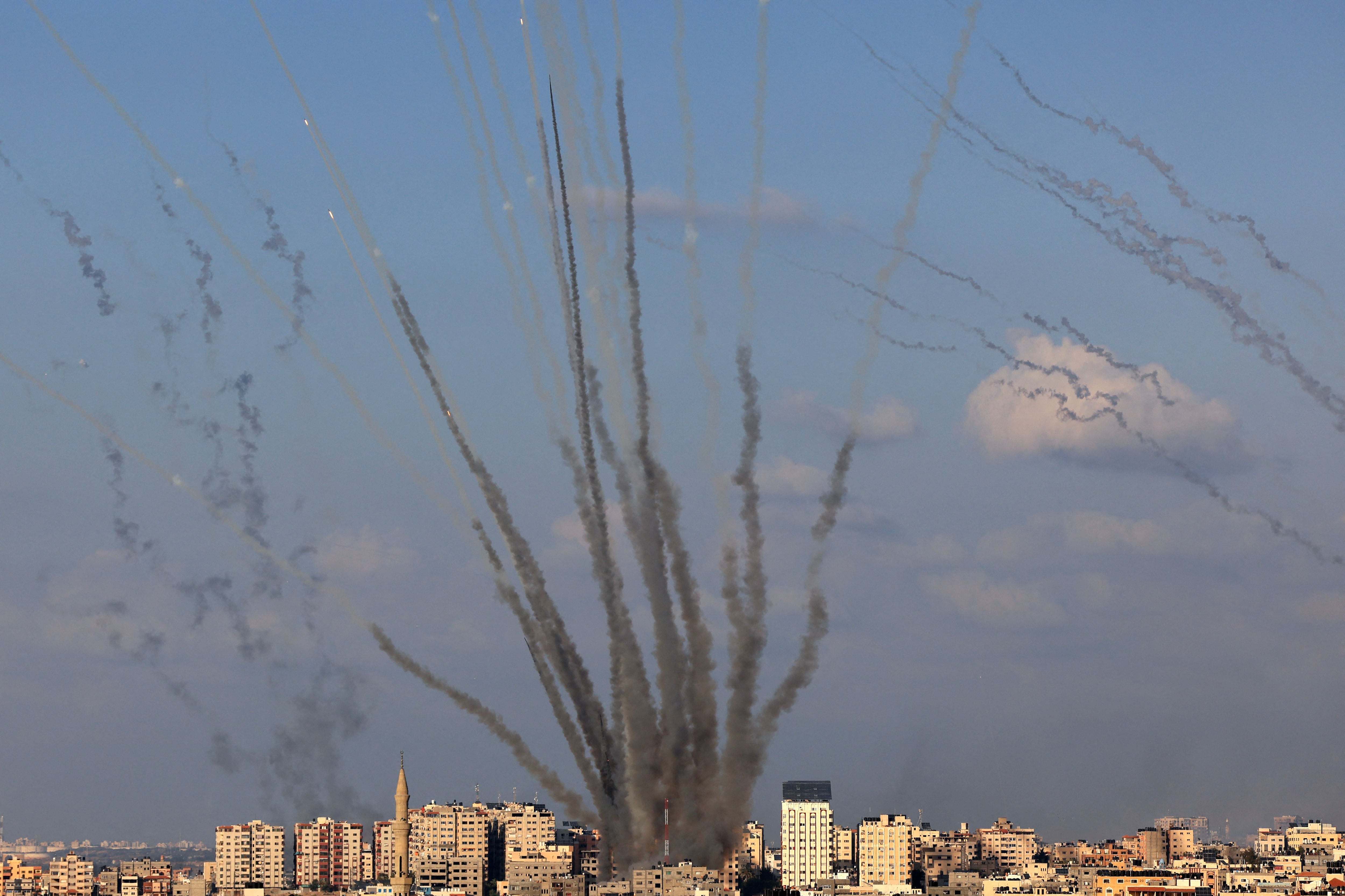 A salvo of rockets is fired by Palestinian militants from Gaza toward Israel on Oct. 10, 2023.