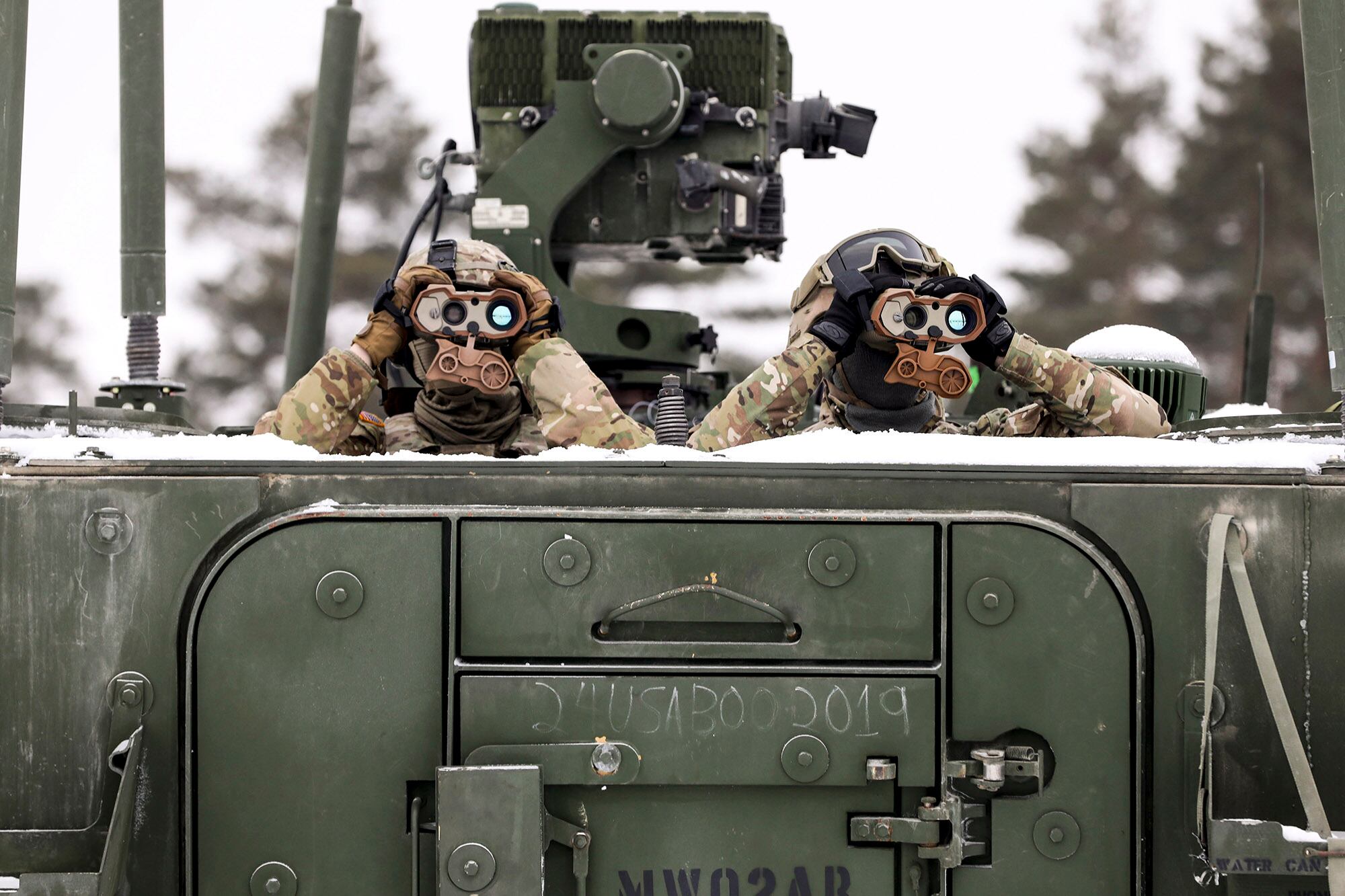 Soldiers from 1st Squadron, 2d Cavalry Regiment, enhanced Forward Presence Battle Group Poland, keep watch on targets  during a joint combat live fire of the Gepard Air Defense System Feb. 2, 2021, at Bemowo Piskie Training Area, Poland.