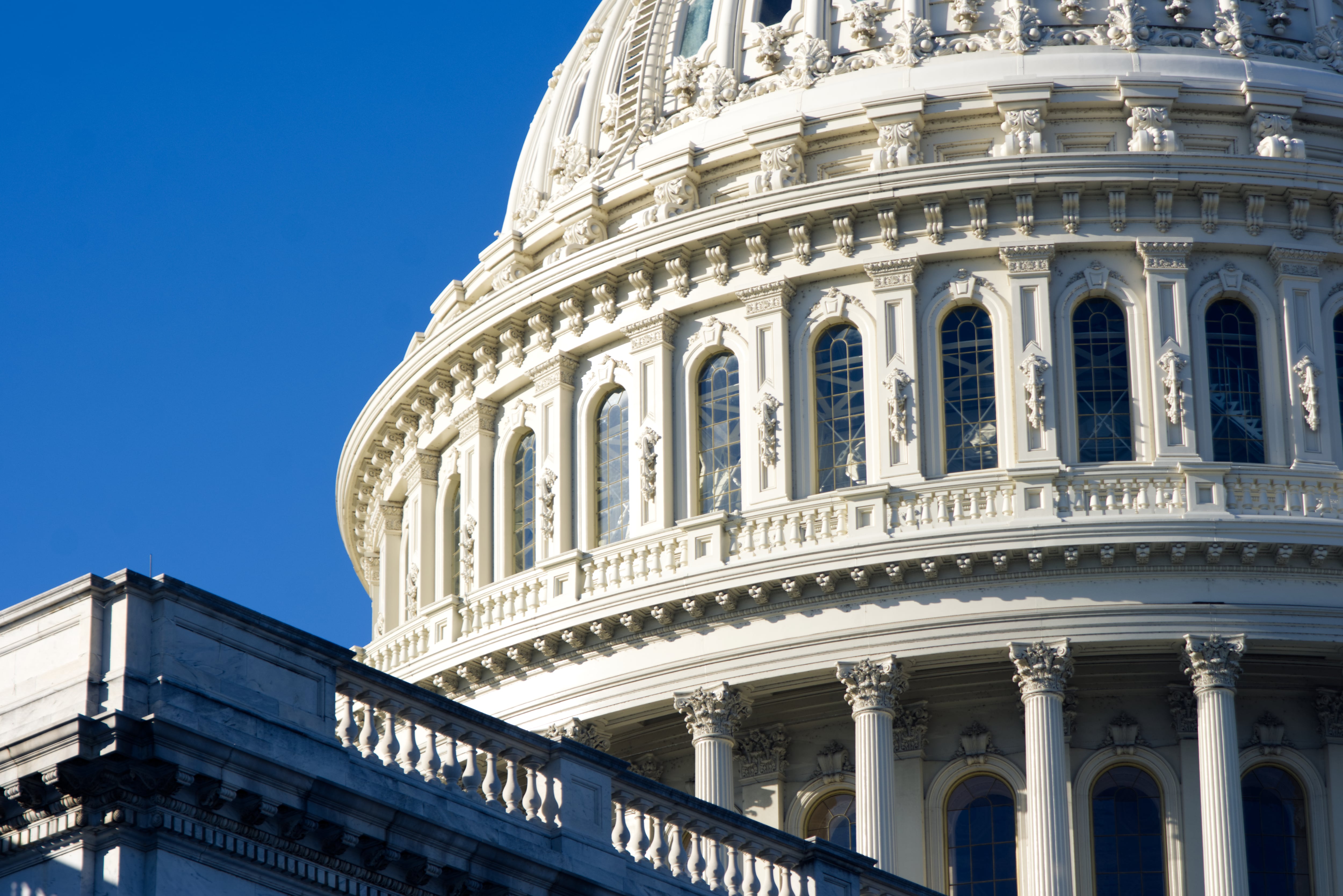 A portion of the Capitol Dome in Washington, D.C., is seen against clear blue skies on Dec. 4, 2022.