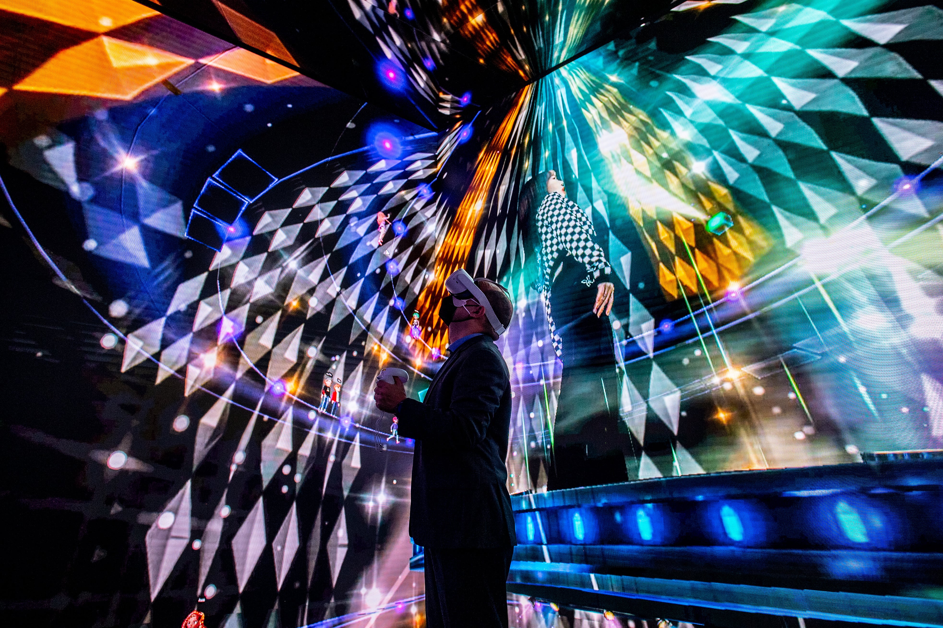 A visitor experiences a virtual-reality experience during the Mobile World Congress conference in Spain in 2022.