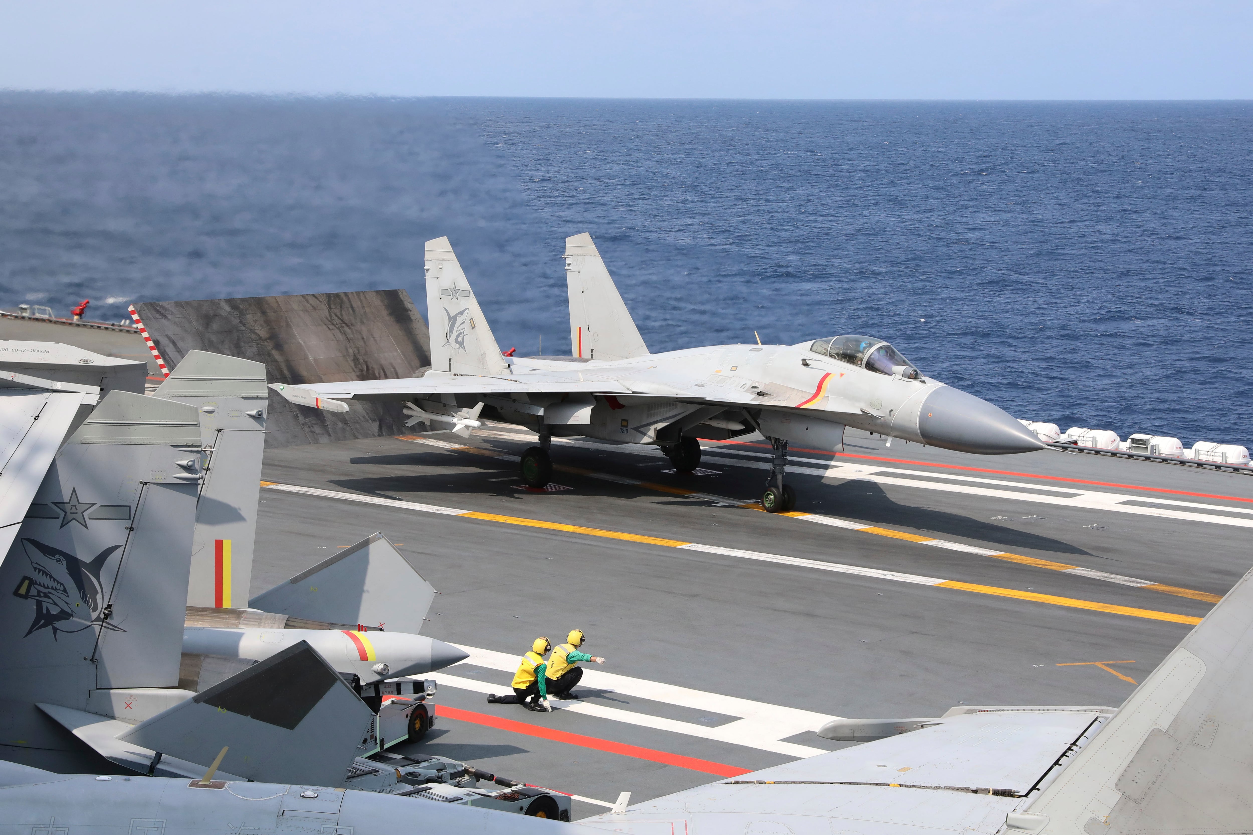 In this photo released by Xinhua News Agency, a J-15 Chinese fighter jet prepares to take off from the Shandong aircraft carrier during the combat readiness patrol and military exercises around the Taiwan Island by the Eastern Theater Command of the Chinese People's Liberation Army (PLA) on Sunday, April 9, 2023.