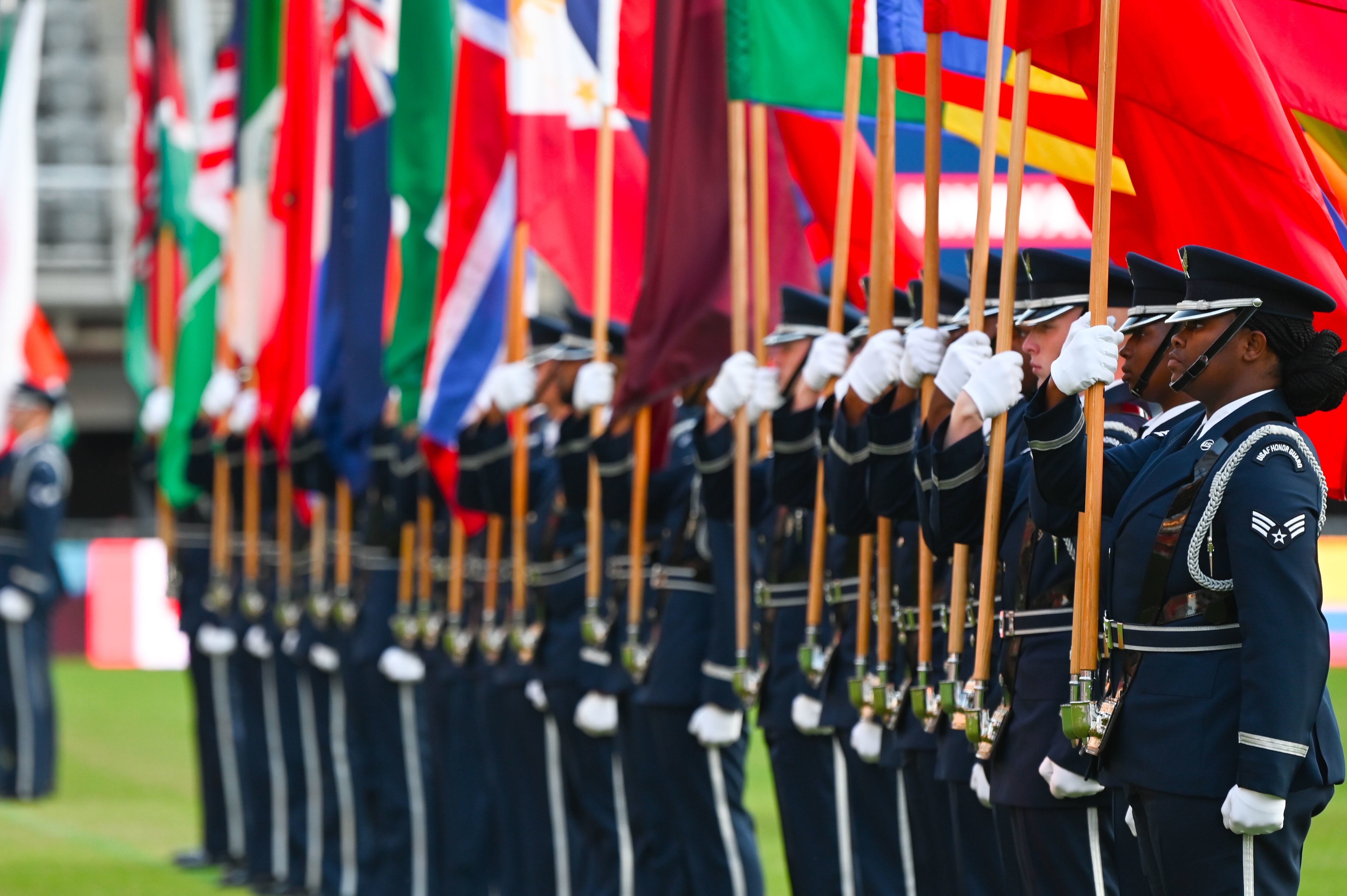 The United States Air Force Honor Guard parades the country flags representing the international air chiefs in attendance at the Air Force 75th Anniversary Tattoo at Audi Field in Washington, D.C., Sept. 15, 2022. The parading of the flags symbolizes the unity and collective power the U.S. has built with its international partners and allies. This display was a part of the celebration of the Air Force’s 75th year. (Staff Sgt. Nilsa Garcia/Air Force)