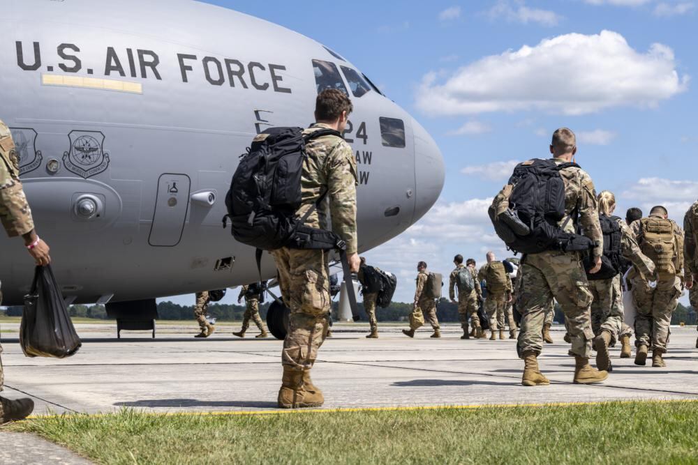 U.S. Air Force airmen assigned to the 23rd Wing board a C-17 Globemaster III at Moody Air Force Base, Georgia, Sept. 24, 2022. C-17s are capable of rapid strategic delivery of troops and cargo in support of deployments. Moody airmen set out on the first-ever operational deployment of the HH-60W to provide rescue services in support of contingency operations. (Airman 1st Class Deanna Muir/Air Force)