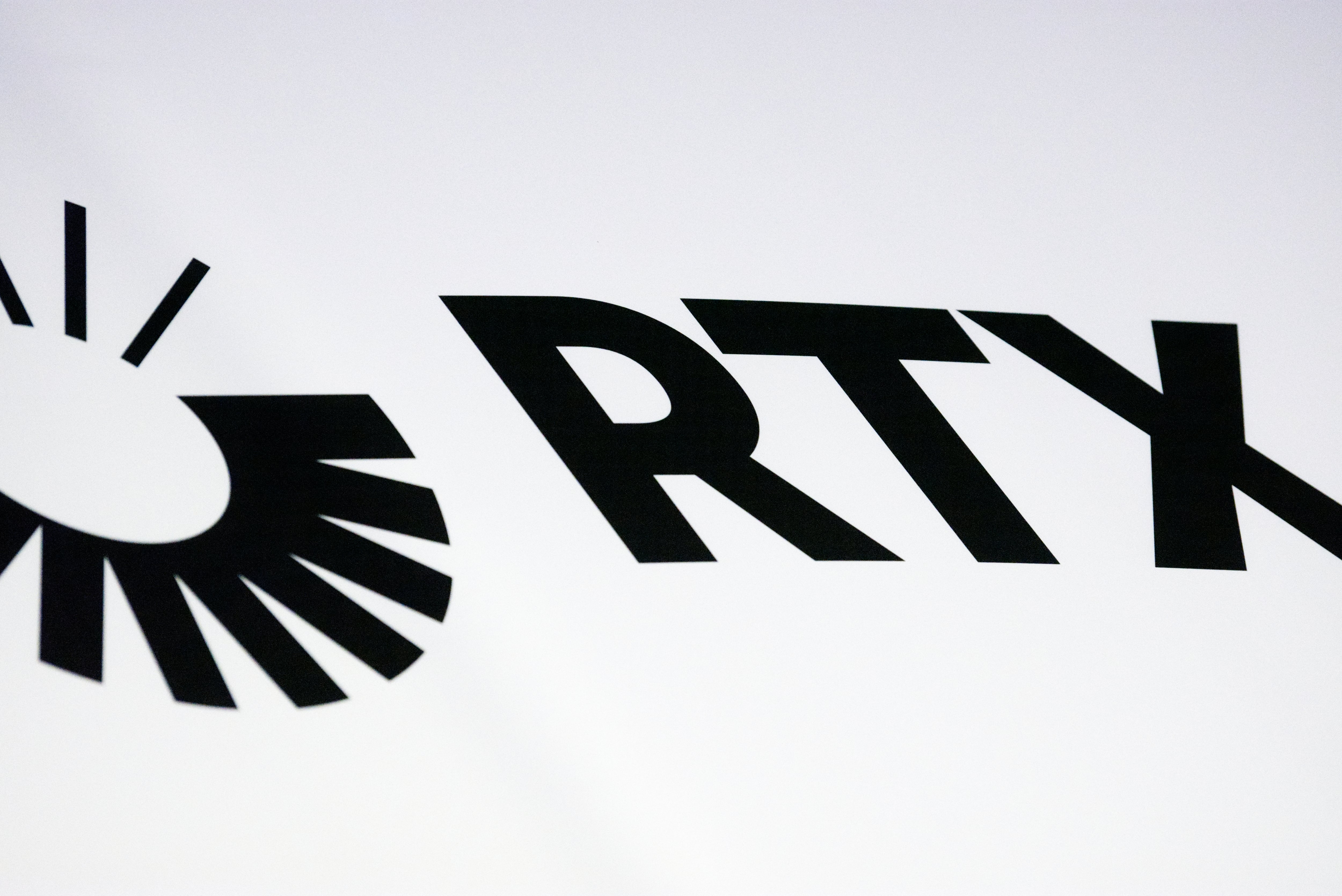 The RTX logo is seen at the company's Sea-Air-Space booth April 9, 2024.