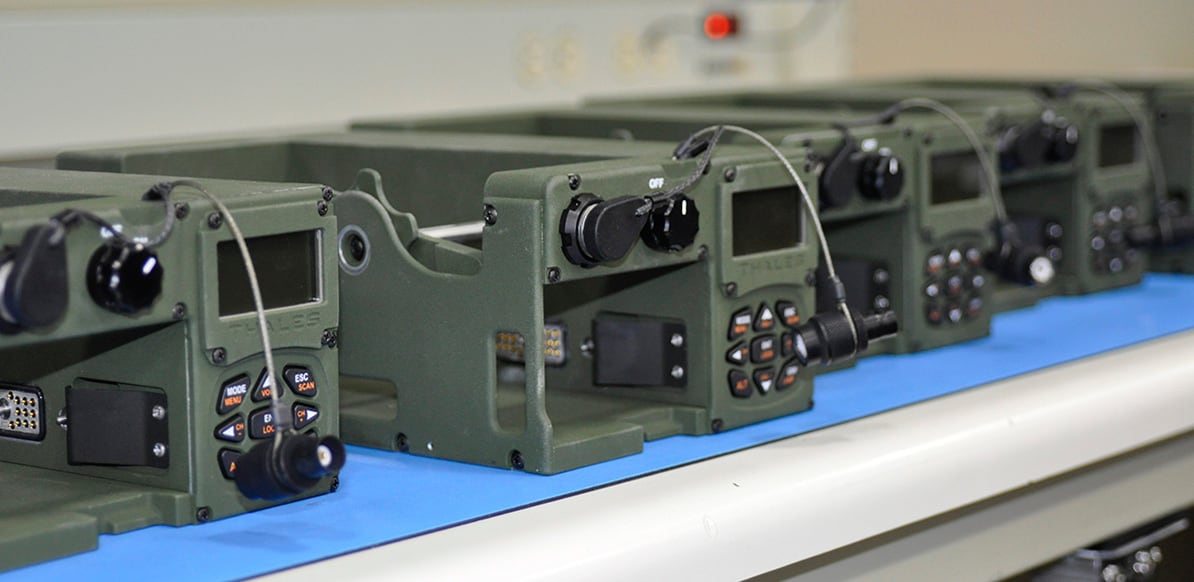 Workers in Clarksburg, Maryland, pump out a wide range of components and gear: radios, chassis, battery packs, fuzes and more.