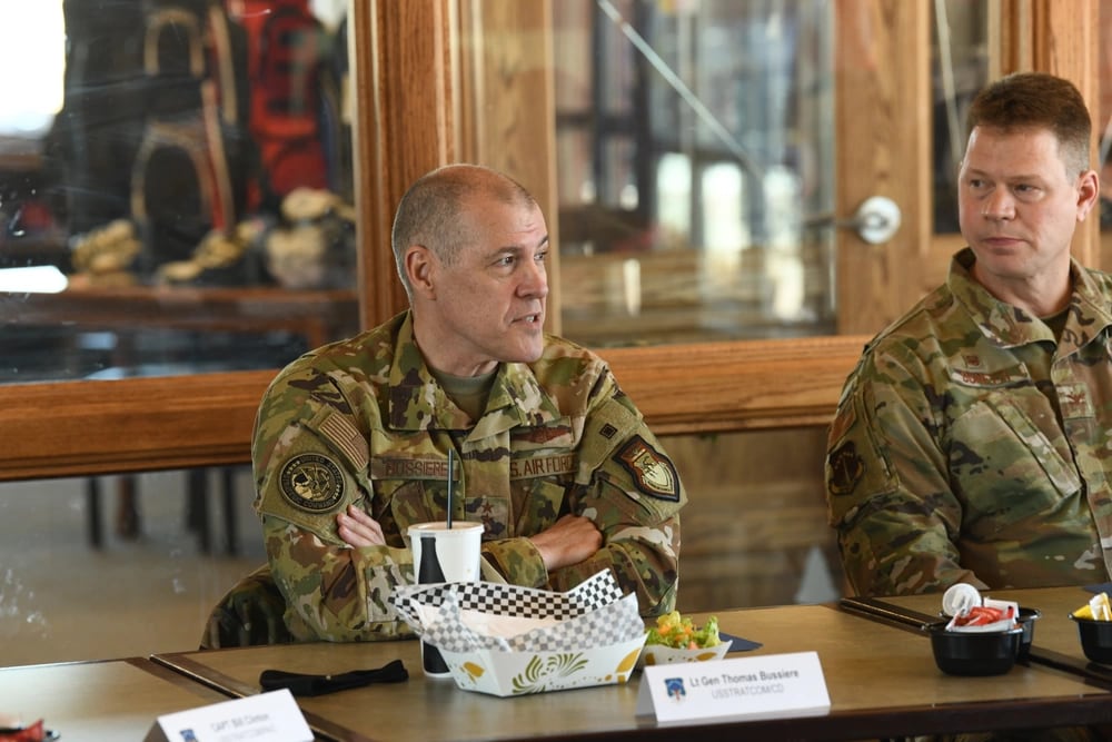 U.S. Air Force Lt. Gen. Thomas Bussiere (left), the deputy commander
of U.S. Strategic Command, has lunch with members of the 90th Operations Support Squadron at F.E. Warren Air Force Base, Wyo., March 31, 2021. Bussiere was nominated in October 2022 to run Air Force Global Strike Command. (Airman 1st Class Darius Frazier/Air Force)