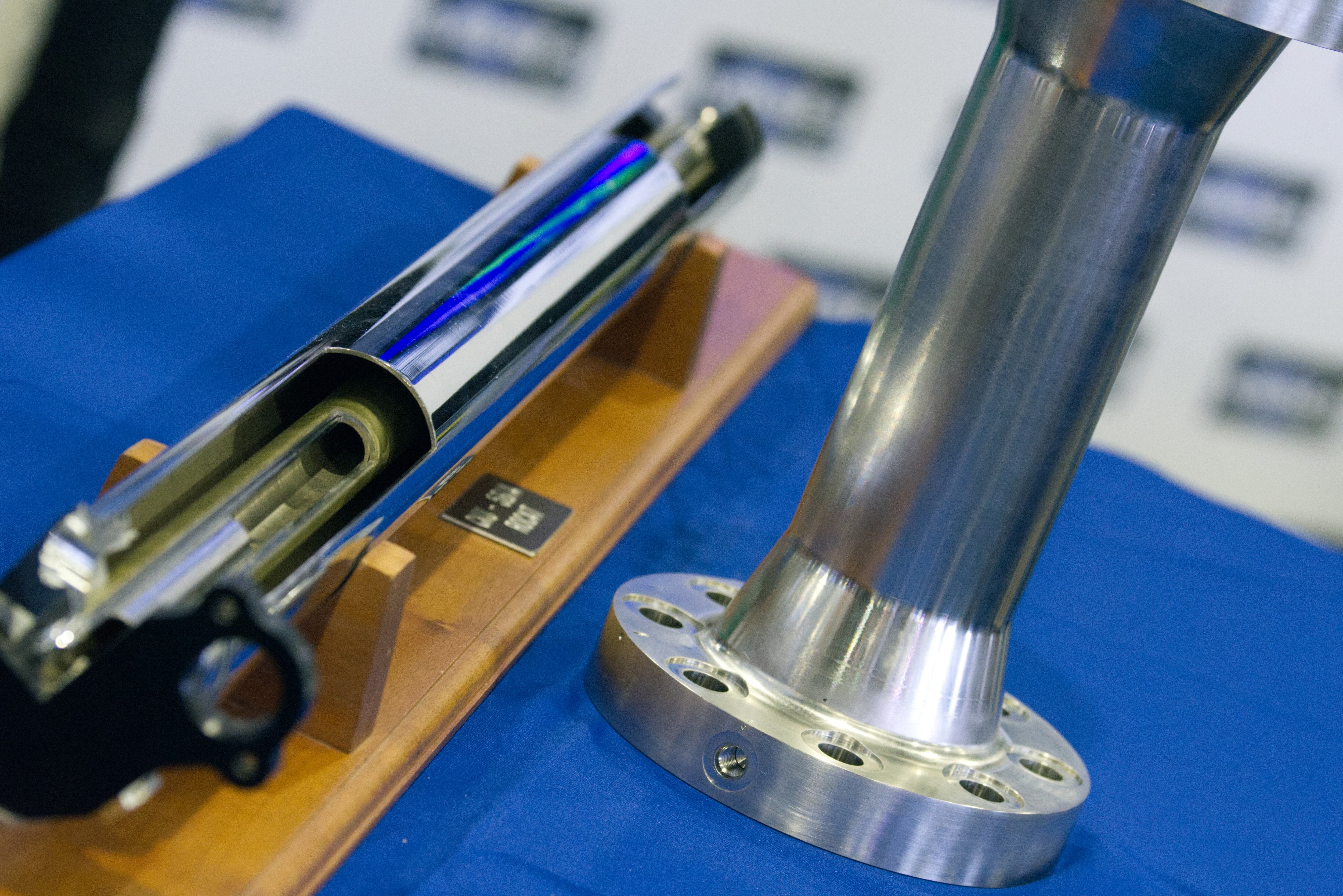 Parts made by additive manufacturing are displayed at a U.S. Navy booth at the Sea-Air-Space conference in Maryland on April 9, 2024.