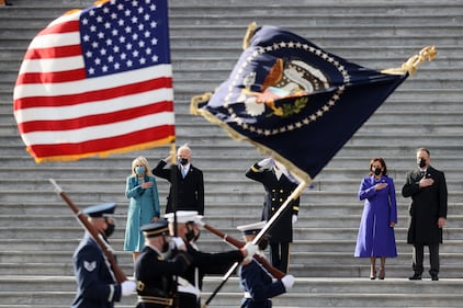 President Joe Biden, first lady Dr. Jill Biden, Vice President Kamala Harris and Douglas Emhoff, husband of Vice President Harris, attend a Pass-in-Review ceremony, hosted by the Joint Task Force-National Capital Region on the East Front of the U.S. Capitol after the 59th Presidential Inauguration on Jan. 20, 2021 in Washington.